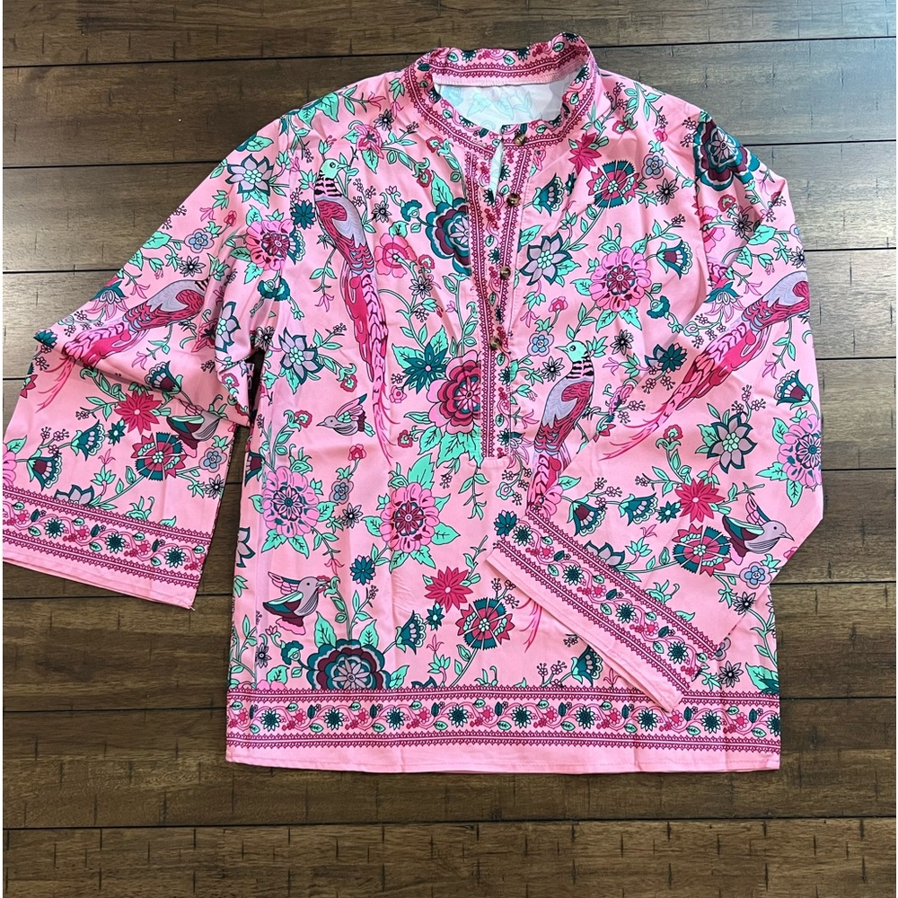 Wonderful fucia blouse with bell sleeve . Two sizes available S and M